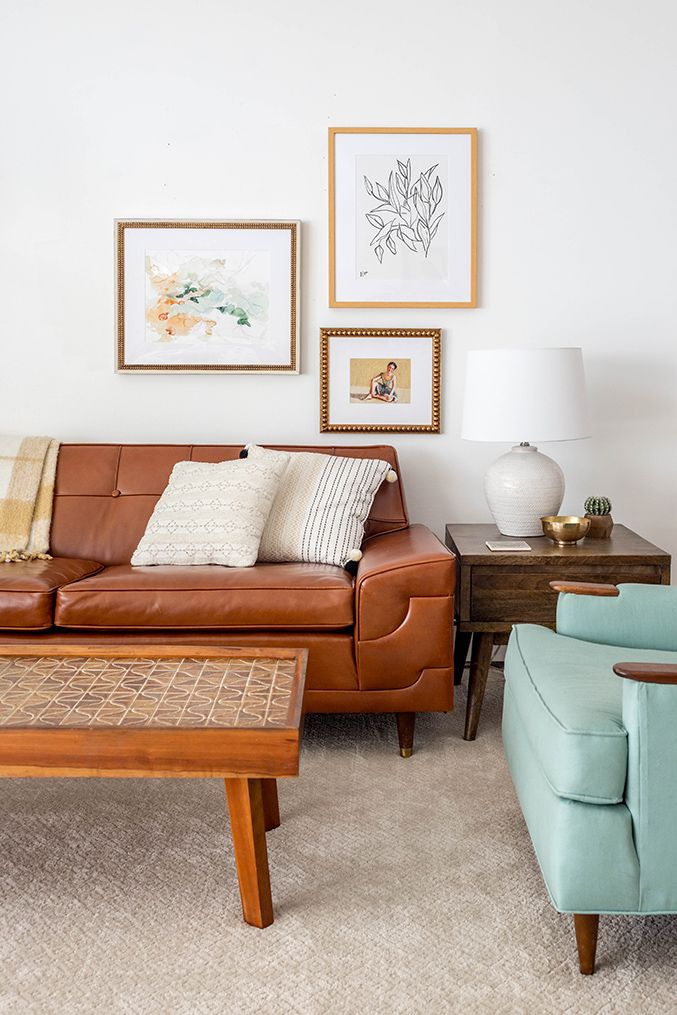 brown home decor | Girlfriend is Better | living room leather sofa mid-century modern